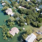 Flooding , homes and houses underwater from destroyed flood event